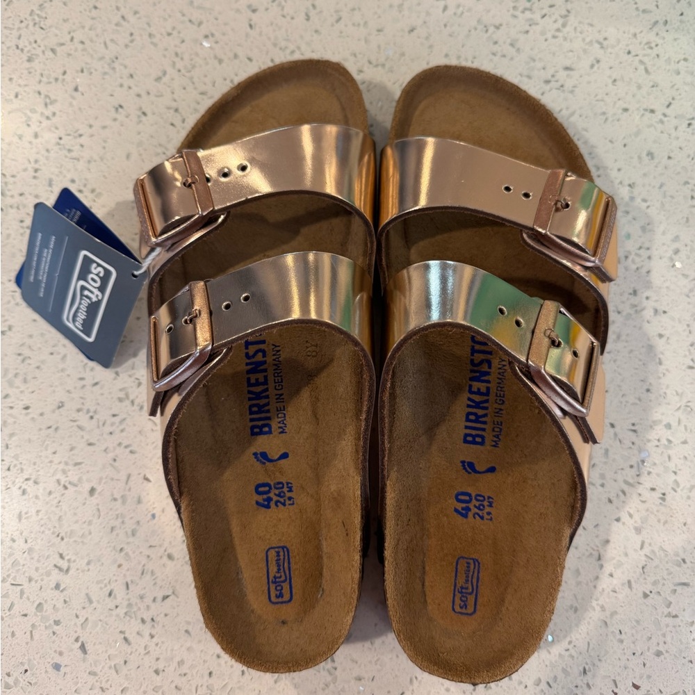 Brand new Rose Gold metallic Birkenstock.
